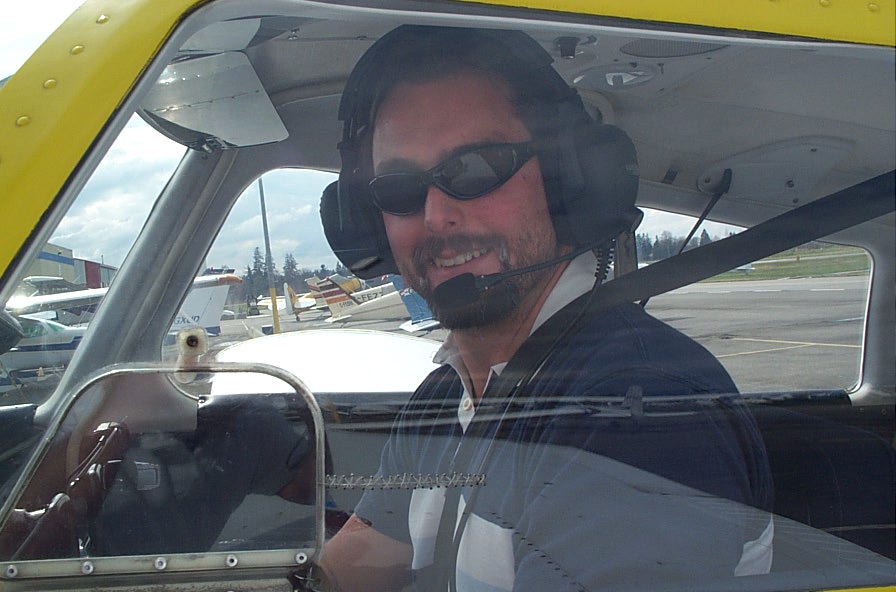 Dr. Josh Olson in the cockpit of Cherokee GODP after his First Solo Flight on April 9, 2009. Langley Flying School.